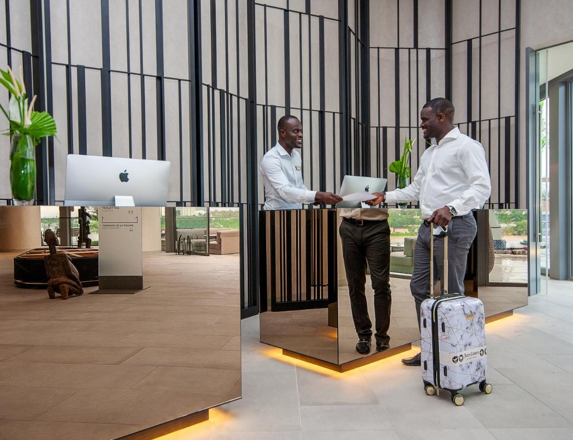 Noom Hotel Abidjan Plateau Exterior photo The hotel's lobby