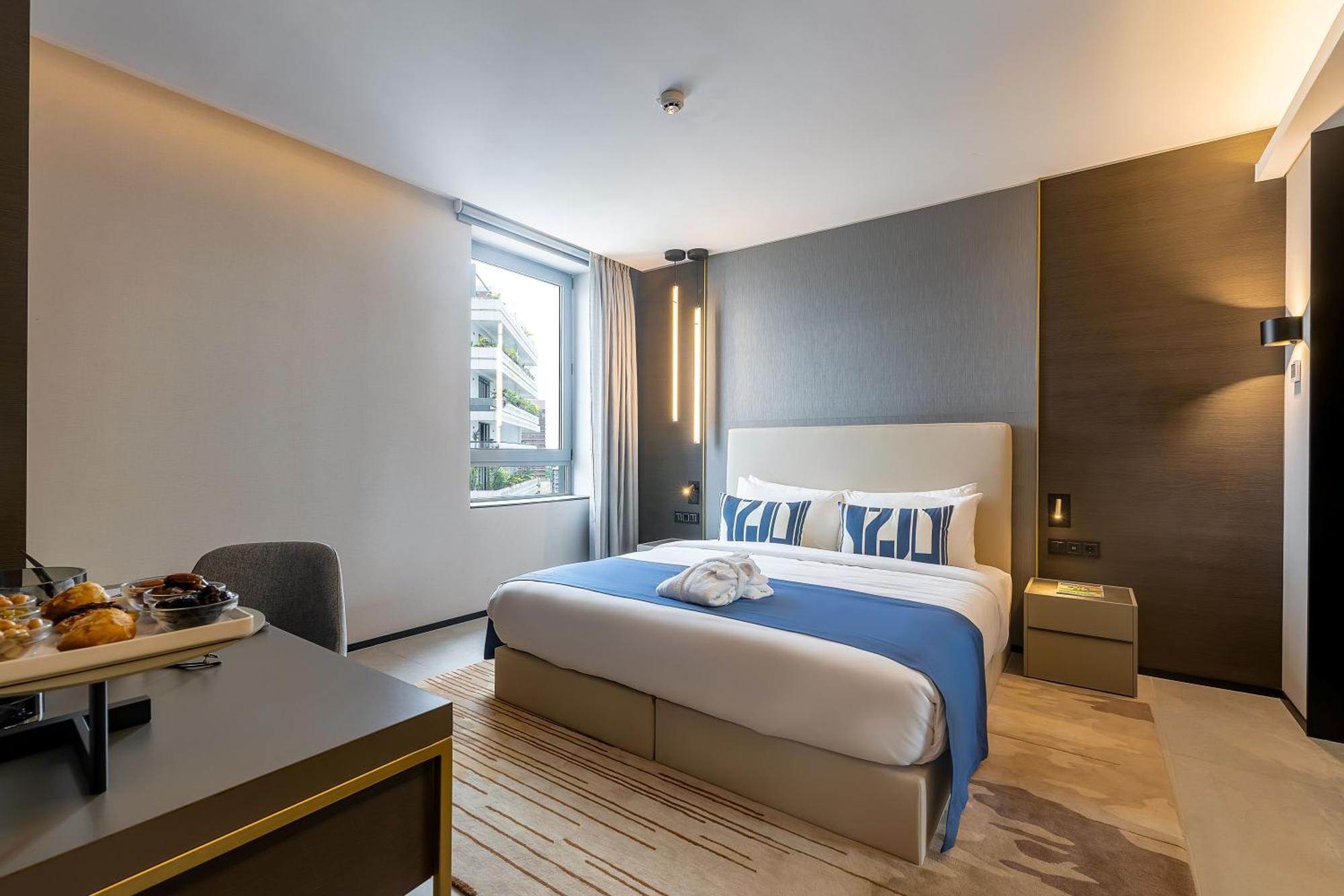 Noom Hotel Abidjan Plateau Exterior photo Deluxe room